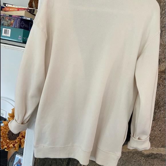 Cream colored cardigan can be worn as an open sweater or buttoned up - Picture 2 of 2